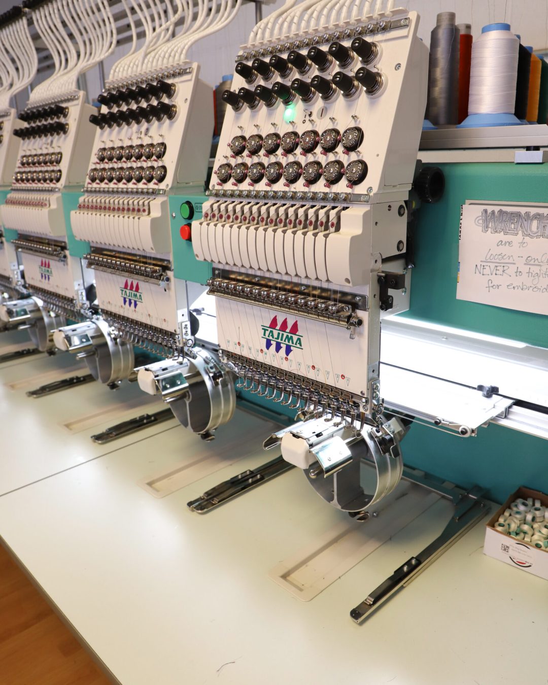 Multi-head embroidery machines at Jones Shirts & Signs