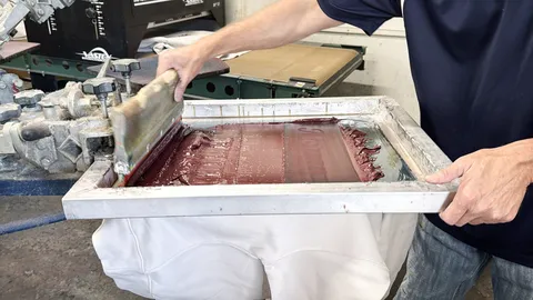 Jones Shirts & Signs screen printing equipment in action